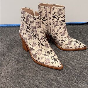 1. State Snakeskin Patterned Heeled Boots